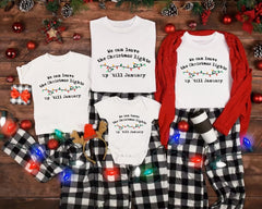 three matching christmas pajamas with lights on them