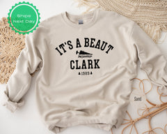 it&#39;s a beauty clark sweatshirt on a table