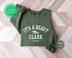 it&#39;s a beautiful clark sweatshirt on a wooden floor