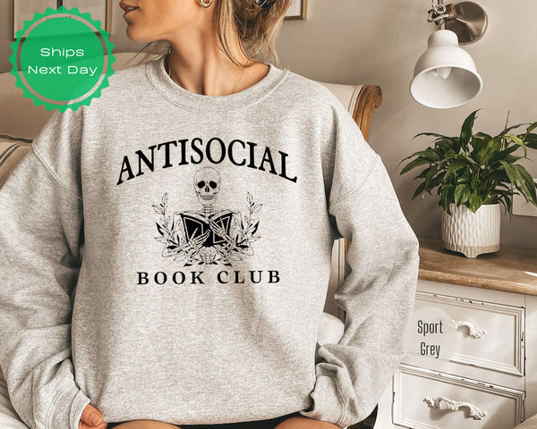 a woman wearing an antisocial book club sweatshirt